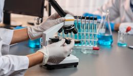 Group of dedicated scientist conduct chemical experiments in lab. Neoteric Group of dedicated scientist conduct chemical experiments and research in medical lab as groundbreaking developing for vaccine drug or antibiotic. Pharmaceutical and biochemistry laboratory. Neoteric
